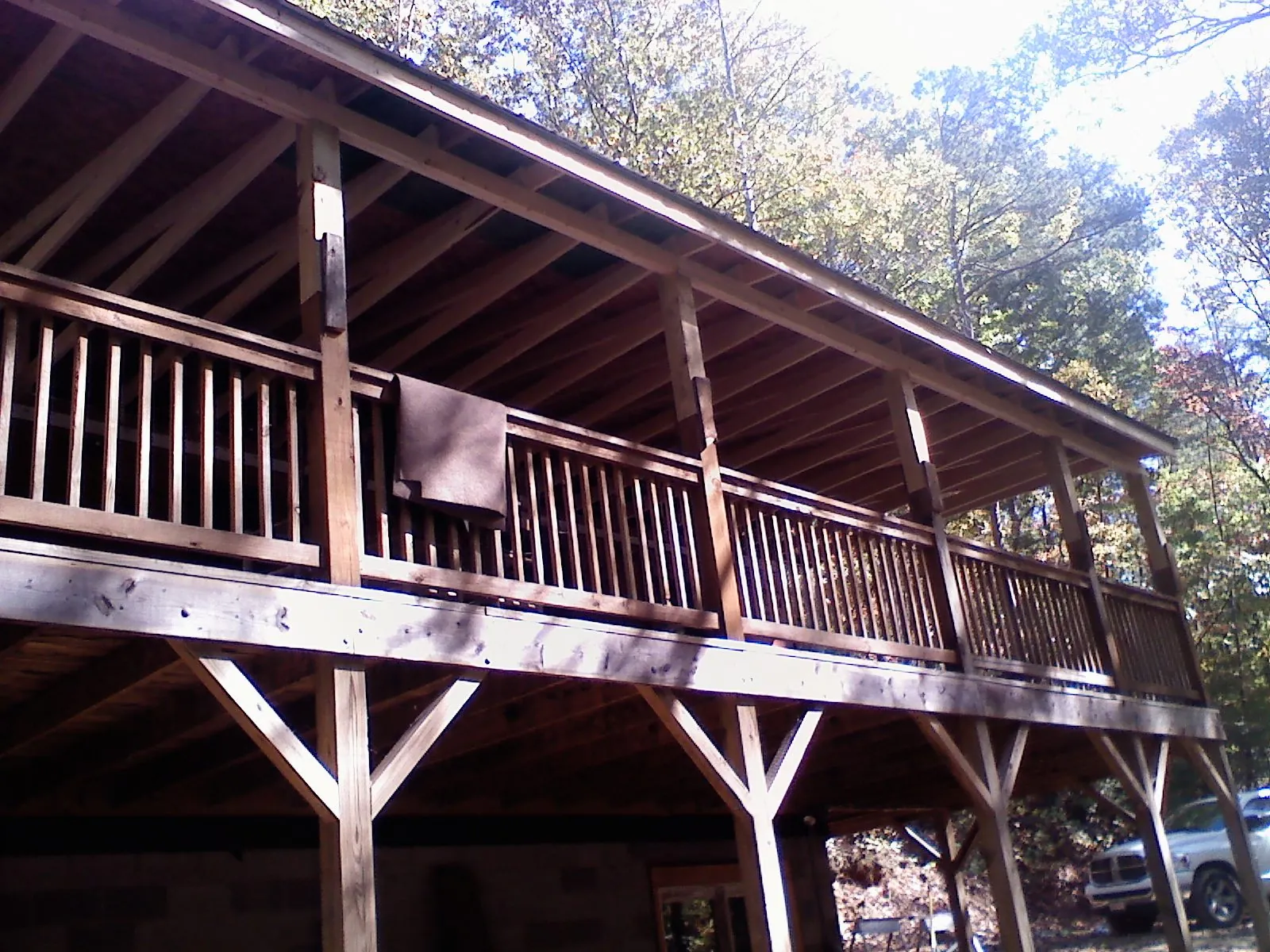 Timber framing under a new elevated porch and deck — Roof Leak Repair in Onondaga by Roofing Brothers